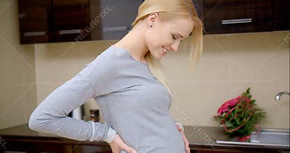 Pregnant Mom Posing at the Kitchen