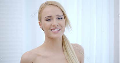 Head and Shoulder Shot of Cheerful Bare Woman