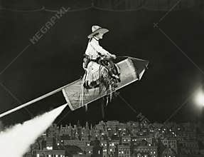 Cowgirl takes off on a rocket
