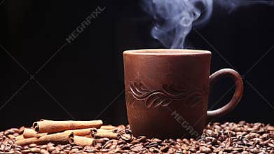 Cup of coffee on black background