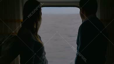 Couple Looking Out the Ferry Window