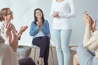 Applauding for friend