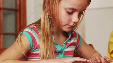 Pupils using tablets with their teacher