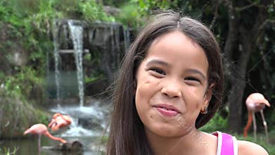 Hispanic Girl Near Waterfall