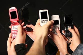 Cell phones in hands