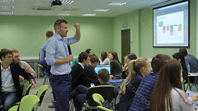 The practical classes at the University. Teacher presentation teaches students the basics of their subject. Students