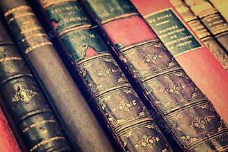 Close up of antique leather books, vintage style