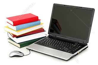 Laptop and Stack of Books