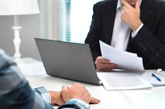 Job interview or meeting with bank worker in office.