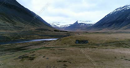 Flying over viking ruins along the coast of remote location in Iceland