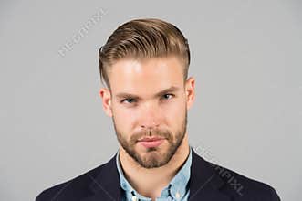 Businessman with beard and mustache on unshaven face. Bearded man with stylish hair or haircut. Beard grooming and hair care in ba