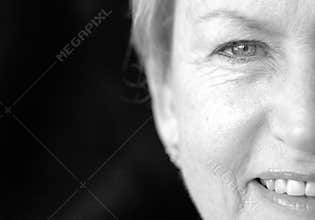 Half face senior woman