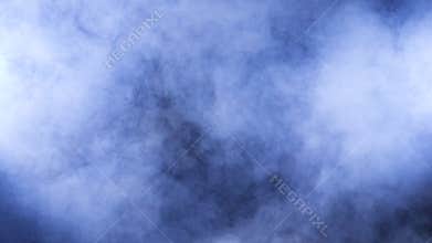 Dense abstract fumes and smoke on black background