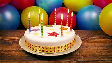 Birthday Cake With Lit Candles On Table