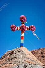 Colorful cross on a chapel in Atacama desert, Chile
