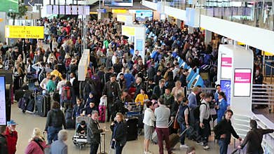 Travelers at Schiphol airport, Amsterdam