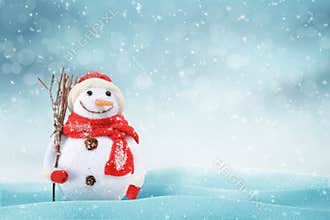 Christmas scene with a cute snowman. Free space for text on right side