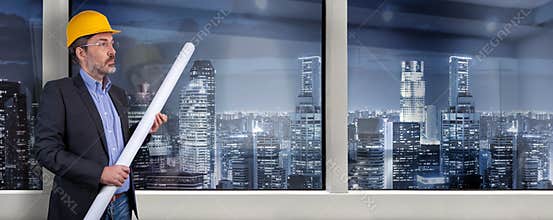 Architect next to the office window