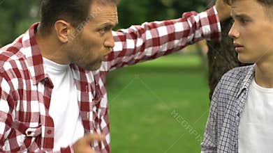 Strict dad scolds son because of disruptive behavior, parent respect, discipline