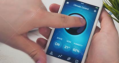 Controlling temperature in the house using smartphone app