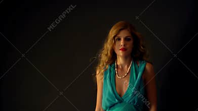 Frightened woman screaming with fear indoor at halloween night.