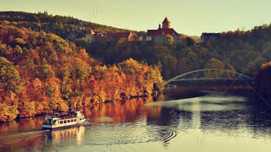 Beautiful autumn landscape with Veveri Castle. Natural colorful scenery with sunset. Brno dam-Czech Republic-Europe.