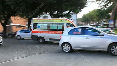 NOVEMBER 4 , 2016 - TIVOLI ITALY : ambulance van passing on traffic on rush hour in tivoli italy
