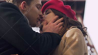 Man breaking up with girlfriend, woman crying, couple kissing for the last time