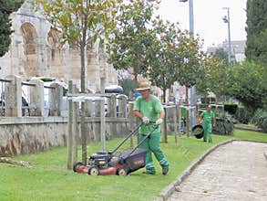 Mowing the grass in front of the Pula Arena