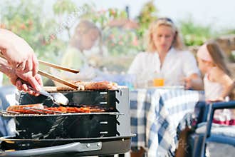 Family having a barbecue