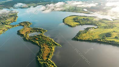 Lyepyel District, Vitebsk Region, Belarus. Aerial View Of Lakes Rivers Islands And Countryside Landscape. Morning Clouds