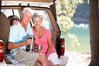 Senior couple having country picnic