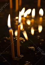 Candles burning in a church