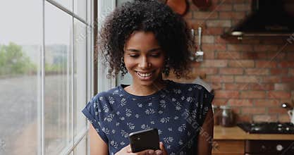 African woman using smartphone enjoy easy e-commerce services