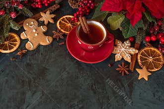 Christmas cup of aromatic tea with spices