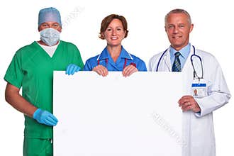Medical team holding a blank poster isolated
