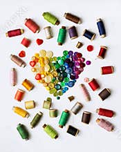 Rainbow heart from old sewing buttons, love of handmade flat lay