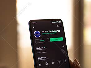 Assam, india - March 10, 2021 : CoWIN app logo on phone screen stock image.