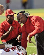 College football - coach with injured player