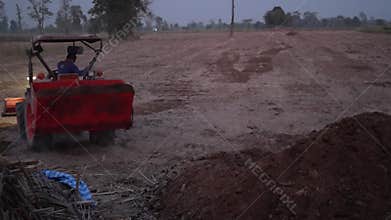 Buriram Thailand, 22 January 2024 , Kubota tractor at farm garden, sugarcane plantation.