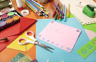 Craft table with a lot of things