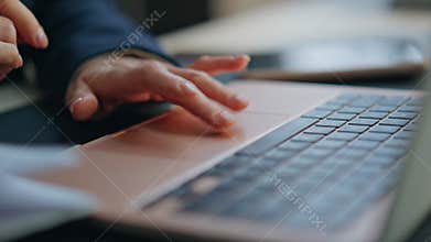 Closeup businesswoman fingers swiping touchpad in office. Executive scrolling