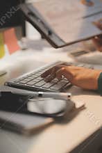 Team of business people working together in the meeting room office, teamwork background charts and graphs banner, double exposure