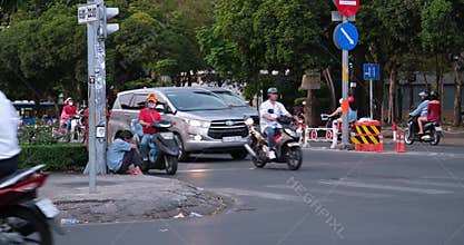 Vietnam Ho Chi Minh City 06.03.2024 Saigon evening people People walk around the city, sit in cafes, ride motorcycles