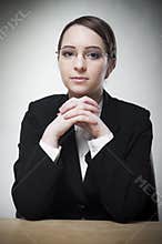 Charming young business woman smiling confidently