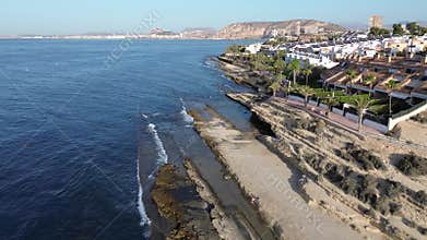 Beautiful villas on the shores of the Mediterranean Sea on a rocky beach.