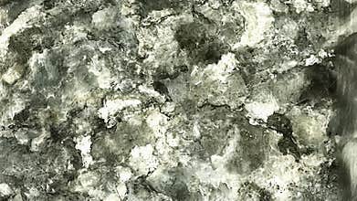 Exploring Unique Textures and Patterns in Natural Stone Discovered at a Local Quarry in Late Afternoon Light