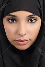 Portrait of a beautiful arab woman face with a black scarf