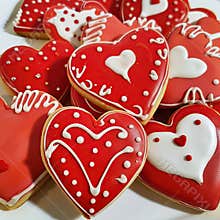 Adorable Red Love Heart Shaped Cookies Decorated with Icing, Perfect for Sharing Sweet Moments
