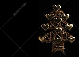 Christmas tree made from sticks and golden hearts